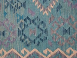 Backside of handmade New Modern Design rug showing knot structure and weave density