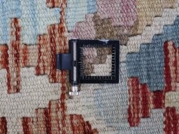 Corner detail of New Modern Design rug showing border pattern and Wool pile