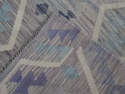 Surface texture of New Modern Design rug with natural Wool and intricate pattern