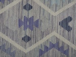 Backside of handmade New Modern Design rug showing knot structure and weave density