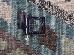 Corner detail of New Modern Design rug showing border pattern and Wool pile