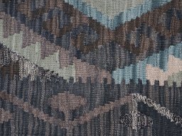 Backside of handmade New Modern Design rug showing knot structure and weave density