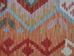 Backside of handmade New Modern Design rug showing knot structure and weave density