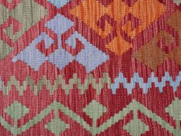 Backside of handmade New Modern Design rug showing knot structure and weave density