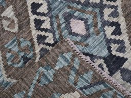 Surface texture of New Modern Design rug with natural Wool and intricate pattern