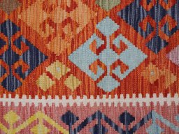Backside of handmade New Modern Design rug showing knot structure and weave density