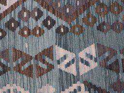 Backside of handmade New Modern Design rug showing knot structure and weave density