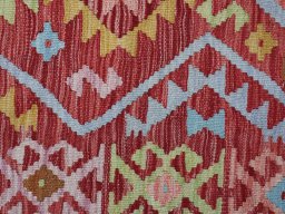 Backside of handmade New Modern Design rug showing knot structure and weave density