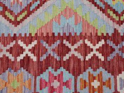Backside of handmade New Modern Design rug showing knot structure and weave density