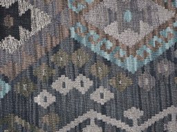 Backside of handmade New Modern Design rug showing knot structure and weave density