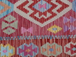 Backside of handmade New Modern Design rug showing knot structure and weave density