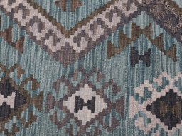 Backside of handmade New Modern Design rug showing knot structure and weave density
