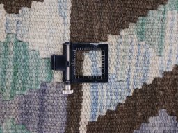 Corner detail of New Modern Design rug showing border pattern and Wool pile