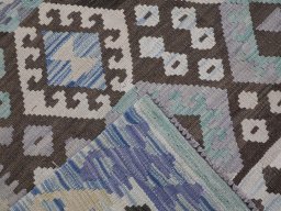 Surface texture of New Modern Design rug with natural Wool and intricate pattern