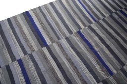 Backside of handmade New Modern Design rug showing knot structure and weave density