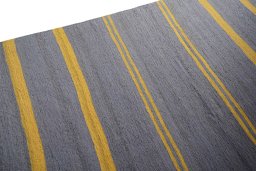 Backside of handmade New Modern Design rug showing knot structure and weave density