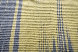 Backside of handmade New Modern Design rug showing knot structure and weave density