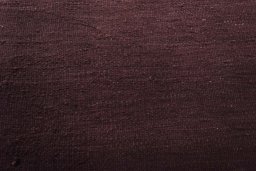 Backside of handmade New Modern Design rug showing knot structure and weave density