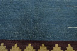 Backside of handmade New Modern Design rug showing knot structure and weave density