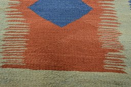 Backside of handmade New Modern Design rug showing knot structure and weave density