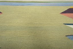 Backside of handmade New Modern Design rug showing knot structure and weave density