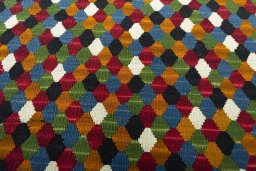 Backside of handmade New Modern Design rug showing knot structure and weave density