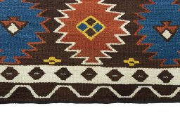 Backside of handmade New Modern Design rug showing knot structure and weave density