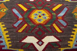 Backside of handmade New Modern Design rug showing knot structure and weave density