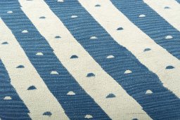 Backside of handmade New Modern Design rug showing knot structure and weave density