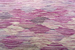 Backside of handmade New Modern Design rug showing knot structure and weave density