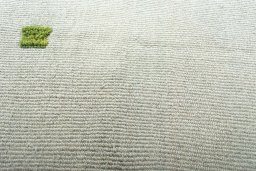 Backside of handmade New Modern Design rug showing knot structure and weave density
