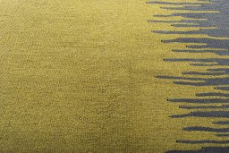 Backside of handmade New Modern Design rug showing knot structure and weave density