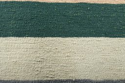 Backside of handmade New Modern Design rug showing knot structure and weave density