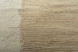 Backside of handmade New Modern Design rug showing knot structure and weave density