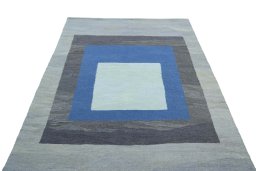 Close-up detail of New Modern Design rug from Iran / Persia showing Wool weave