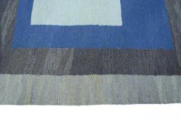 Close-up detail of New Modern Design rug from Iran / Persia showing Wool weave