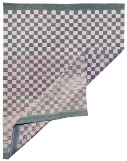Backside of handmade New Modern Design rug showing knot structure and weave density