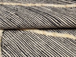 Surface texture of New Modern Design rug with natural Wool and intricate pattern