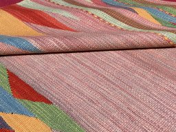 Backside of handmade New Modern Design rug showing knot structure and weave density
