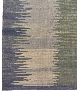 Backside of handmade New Modern Design rug showing knot structure and weave density