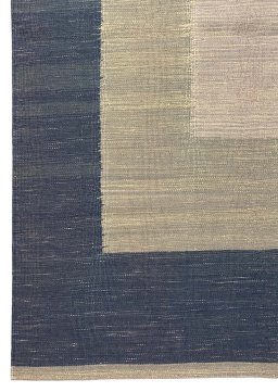 Backside of handmade New Modern Design rug showing knot structure and weave density