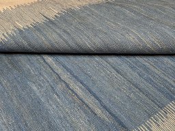 Backside of handmade New Modern Design rug showing knot structure and weave density