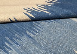 Close-up detail of New Modern Design rug from Iran / Persia showing Wool weave