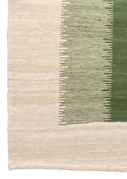 Backside of handmade New Modern Design rug showing knot structure and weave density