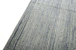 Surface texture of New Modern Design rug with natural Wool and intricate pattern