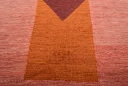 Backside of handmade New Modern Design rug showing knot structure and weave density