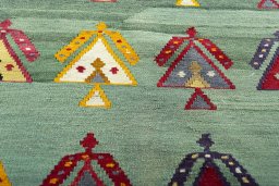 Backside of handmade New Modern Design rug showing knot structure and weave density