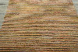 Backside of handmade New Modern Design rug showing knot structure and weave density