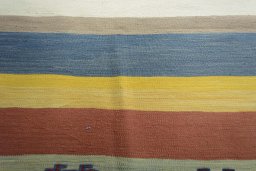 Backside of handmade New Modern Design rug showing knot structure and weave density