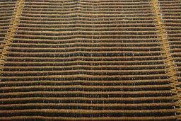 Backside of handmade New Modern Design rug showing knot structure and weave density